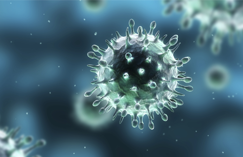 Round, iridescent, green-blue H1N1 (swine flu) virus with protrusions.